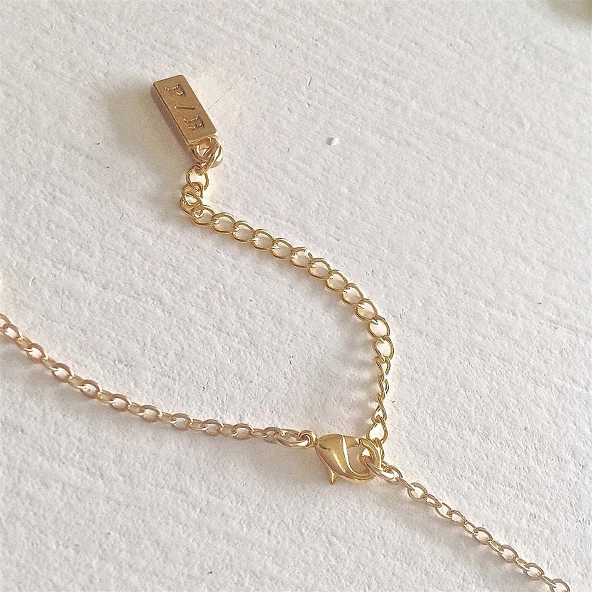 "Fleur" Round Floral Locket Necklace in Raw Brass