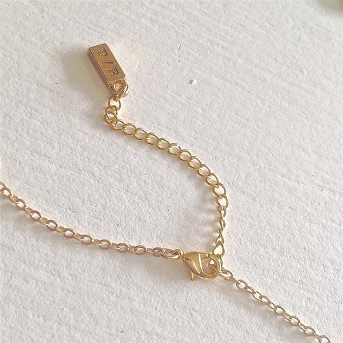 "Fleur" Round Floral Locket Necklace in Raw Brass