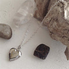 "Total Eclipse of the Heart" Tiny Heart Shaped Locket in Silver