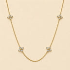"Callanthé" Multi Flower Charm Necklace in Gold