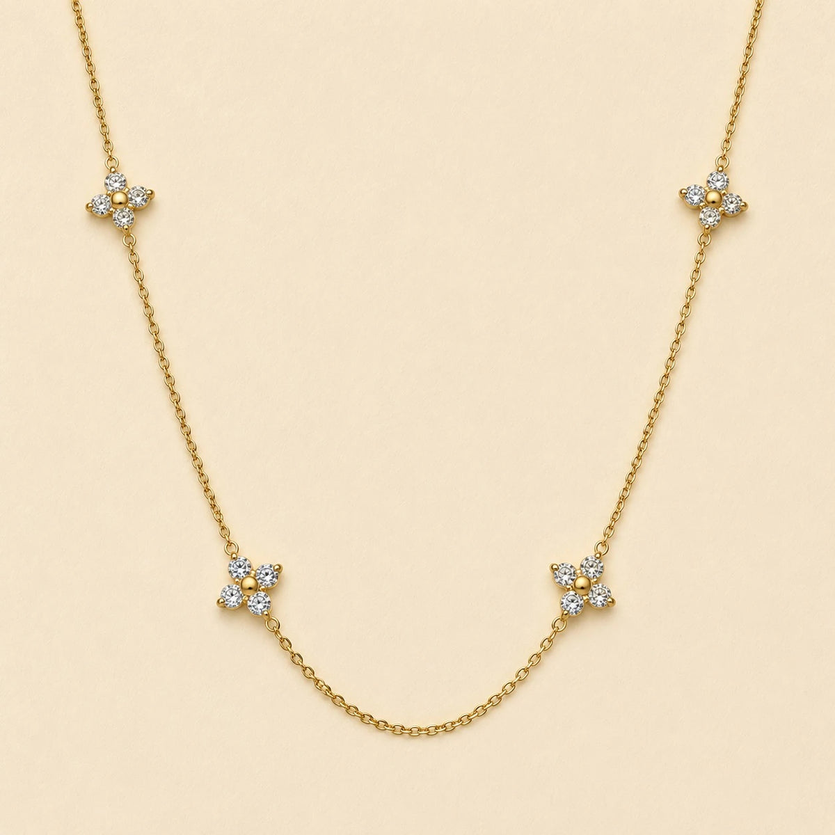 "Callanthé" Multi Flower Charm Necklace in Gold