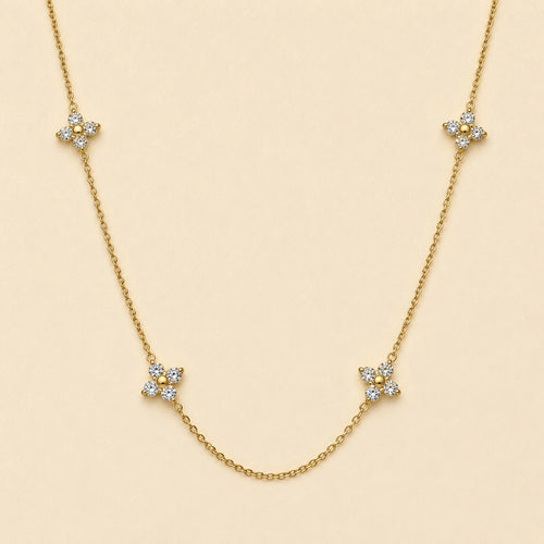 "Callanthé" Multi Flower Charm Necklace in Gold